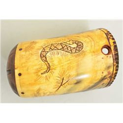 Horn drinking cup with carved decorations and  wooden bottom made similar to an American  powder hor