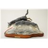 Original bronze portraying wolves entitled  “Break Away” by Renee Headings.  The bronze  measures 18