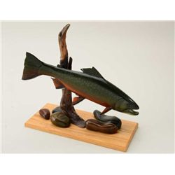 Hand carved figural display featuring wood  brook trout numbered 507 and signed on base  by “John Ze