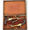 Image 5 : Cased pair of center hammer Flintlock pistols  with spring bayonets and constructed of  brass in ori