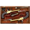 Image 6 : Cased pair of center hammer Flintlock pistols  with spring bayonets and constructed of  brass in ori