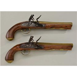 Pair of American Flintlock pistols circa  early 19th century with brass octagon  barrels, simple Ame