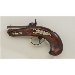 Philadelphia percussion derringer by Slotter  but marked J. Derringer who was a taylor that  allowed