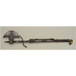 Indian matchlock combination battle axe and  dagger with silver inlay and brass accents.  Refer “Var