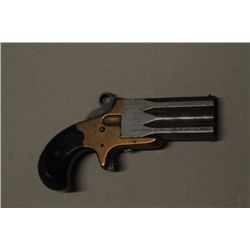 Frank Wesson over/under .22 caliber vest  pocket derringer. Serial #1861. The derringer  remains in 