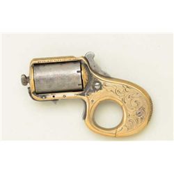 Reid (my friend) knuckle duster in 22  caliber, serial #7494, frame period script  engraved with “do