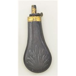 Embossed pistol sized powder flask with leaf  design for small framed pistol circa about  1850.  The