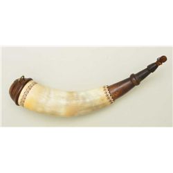 Contemporary carved powder horn in American  18th century style showing a carved horn  compartment i