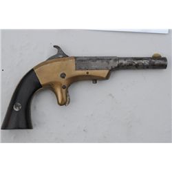 Merwin & Bray .22 cal., derringer in good to  very good condition with nice patina on  brass; one of