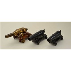 Lot of 3 small old metal display cannons  including a pair of all metal cannons on  metal carriages 