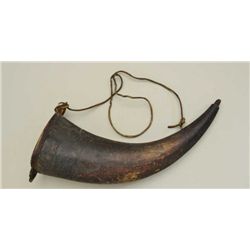 18th to 19th century powder horn of large  size measuring 14” across curve, wood plug in  butt measu