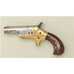 Colt, no. 3, .41 caliber derringer nickel  plated with grips. Serial #7972. The pistol  shows a uncl