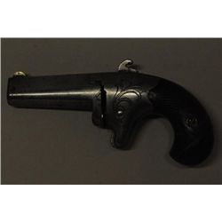 Colt No. 2, 41 cal derringer in good  condition, serial #3764.  The metal surfaces  show a gray pati