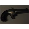 Image 2 : Colt No. 2, 41 cal derringer in good  condition, serial #3764.  The metal surfaces  show a gray pati