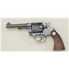 Image 1 : Colt Police Positive DA revolver, .38 Special  cal., 4” barrel, blue finish, checkered wood  medalli