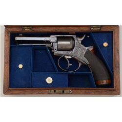 Cased Tranter’s patent DA revolver, .31 cal.,  4” barrel, blue finish, engraved frame,  checkered wo