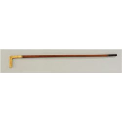 Antique carved cane of collector's quality  circa late 19th early 20th century with L  shaped grip a