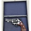 Image 1 : Smith & Wesson Model 29, 44 magnum cal.  Double action revolver with 4” barrel,  checkered medallion