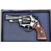 Image 4 : Smith & Wesson Model 29, 44 magnum cal.  Double action revolver with 4” barrel,  checkered medallion
