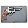 Image 7 : Smith & Wesson Model 29, 44 magnum cal.  Double action revolver with 4” barrel,  checkered medallion