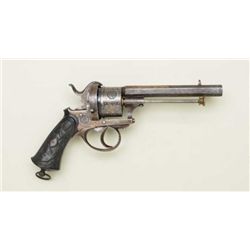 Ornate double action pin fire revolver  showing gold and silver inlay, relief  engraved florals and 