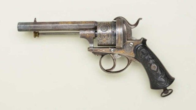 Ornate double action pin fire revolver showing gold and silver inlay ...