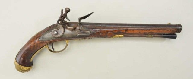 Germanic Flintlock pistol, circa 1700-1750 with ornate cast brass mounts that are gold gilted and