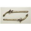 Image 1 : Pair of Balkan Flintlock pistols with cast  ornate silvered stocks and miquelet locks,  circa late 1