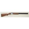 Image 1 : Beretta Model 682 sporting 12 gauge over and  under shotgun with 28" split barrels, magna  ported to