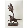 Image 2 : Older restrike of Frederic Remington’s bronze  showing Indian signaling with hide. The  bronze measu