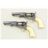 Image 2 : Fine pair of Gustave Young extra fancy  engraved Colt Model 1849 pockets with 4”  barrels, blue and 