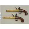 Image 1 : Pair of Queen Anne style flintlock pistols  with brass barrels and frames signed Wilson,  London. Th