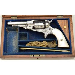 Cased scroll and floral period engraved  Remington New Model Pocket conversion  revolver, .32 cal., 