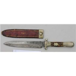 Spear point bowie knife marked “Alexander  Sheffield” with N.Y. and Shield on blade and  scabbard; b