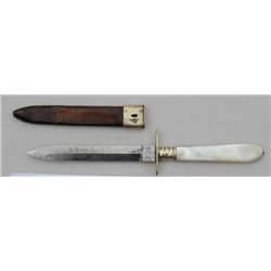 Dirk knife with pearl grip marked Manhattan  Cutlery Co. Sheffield. Good overall, normal  age. Scabb