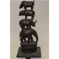 Authentic African carving of stacked animals  measuring approx. 30-1/2” in height mounted  on base w