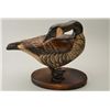 Image 2 : Art carving of duck nicely painted with  bronze feet, glass eyes, signed on base “Tom  Tab and John 
