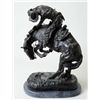 Image 1 : Older large re-cast of a Frederic Remington  bronze of a cowboy on bucking horse, on stone  base app