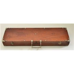 Older wooden carry case with metal corners,  double front latches and two-piece metal  handle, appro