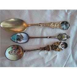 (3) Enameled Collector's Spoons to include: a) Pierced and Enameled handle, Enameled transfer couple