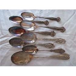 (8) Collectible Serving Spoons to include: a) Embossed serving spoon patterned tip, monogrammed "M.L