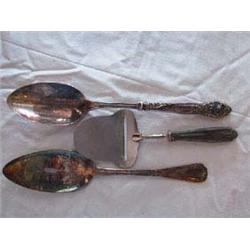 (3) Serving pieces to include: a) Large Hollow-ware serving spoon, Embossed flowered handle, un-mark