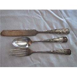 (3) Piece Children's Flatware Set consisting of 6" Fork, 5 1/2" Spoon, and 7" Knife. Meriden Silver.