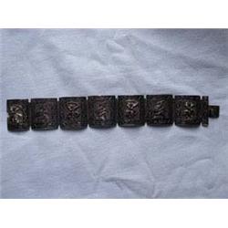 Sterling Bracelet-7 decorated links w/dancing woman and flute playing male. 7 1/2" Lgth (including c
