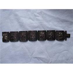 Sterling Bracelet-7 decorated links w/dancing woman and flute playing male. 7 1/2  Lgth (including c