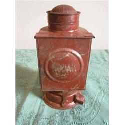 Early tin "Kodak" dark room lantern. Old brown paint, glass missing. 9" tall. APV $25.00-$30.00....