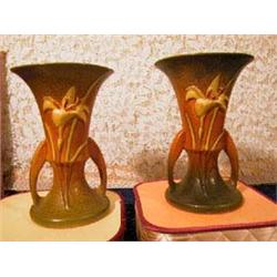 (2) Pieces of matching Roseville vases. Base Mark U.S.A. 132-7". One piece has small nick and hairli