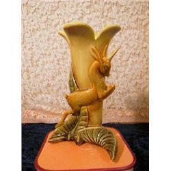 Hull Pottery Gazelle and Leafed base vase. U.S.A, base mark "#98" 9 1/2" tall. One chip on leaf base