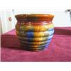 Image 1 : Beautiful multi-colored beehive style JardiniFre. Colors include blues, browns, and greens. Un-marke
