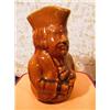 Image 1 : Toby 6" Stoneware pitcher w/Rockingham glaze finish. Condition-excellent. APV $50.00-$75.00....